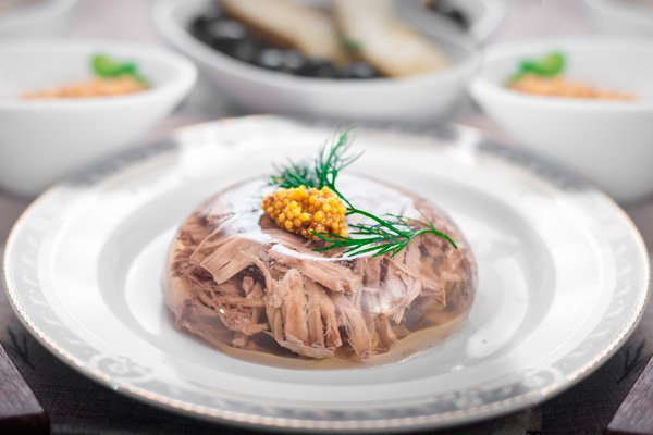 Holodets (Холодец) Holodets (Холодец) - Traditional Russian meat jelly made from slow-cooked pork and beef. A festive cold appetizer.